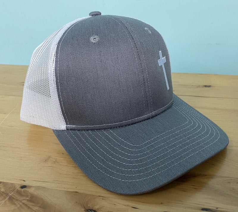 Trucker Hat with embroidered cross side placement