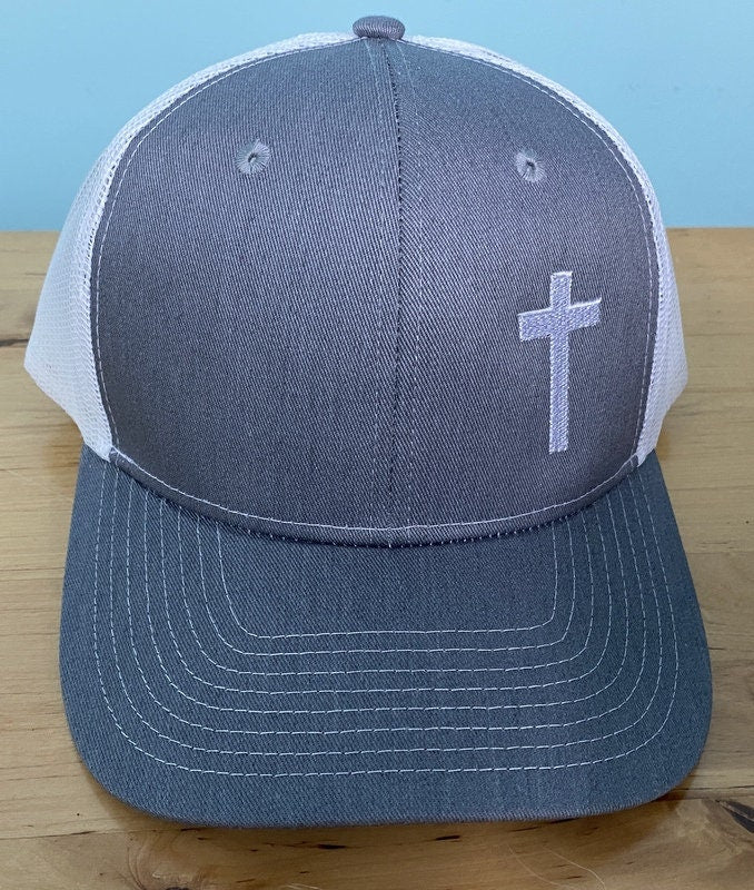 Trucker Hat with embroidered cross side placement